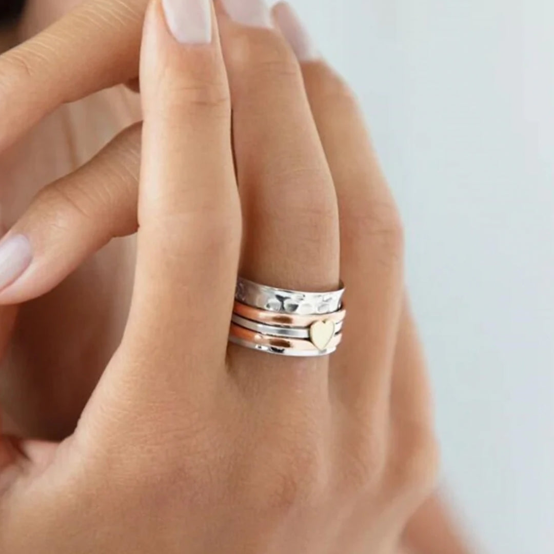 Bague cœur rotative