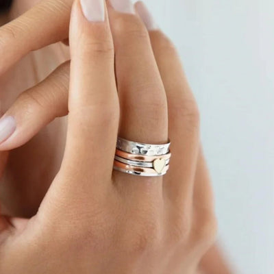Bague cœur rotative
